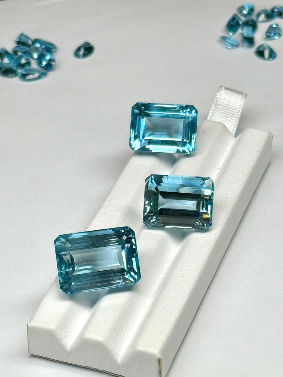 Matched trio of emerald-cut aquamarines